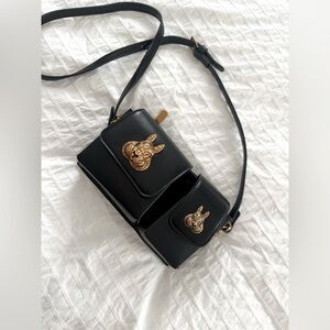 Black Crossbody Bag with Gold Animal Emblem